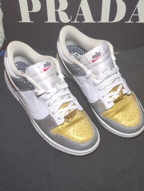 Nike Women’s Dunk Low SE " Heirloom"  in White Metallic Gold & Silver $75